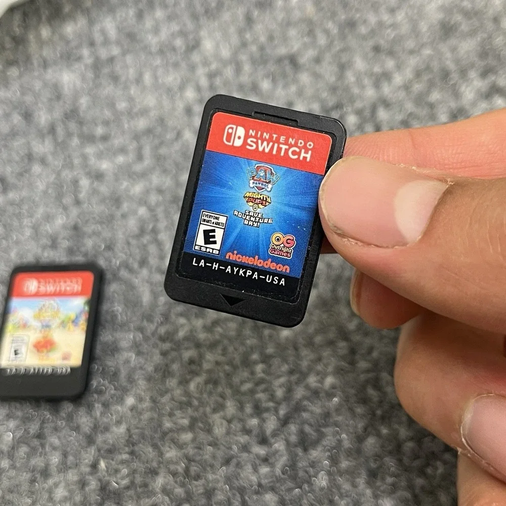 PAW Patrol Mighty Pups + Ryan's Road Trip Deluxe Nintendo Switch Lot Cartridges